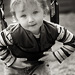 toddler boy on swing, photographed in Belleville, IL park by Dinan Photo